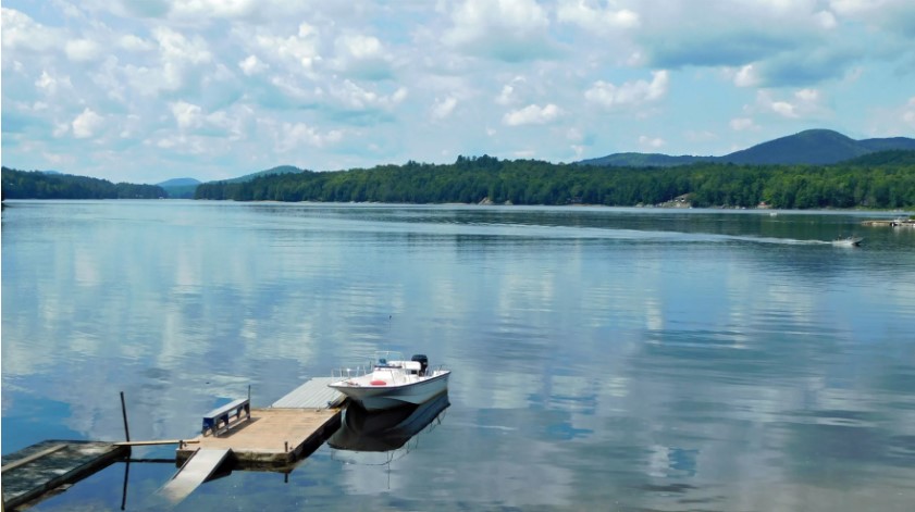 A boat and dock on Raquette Lake