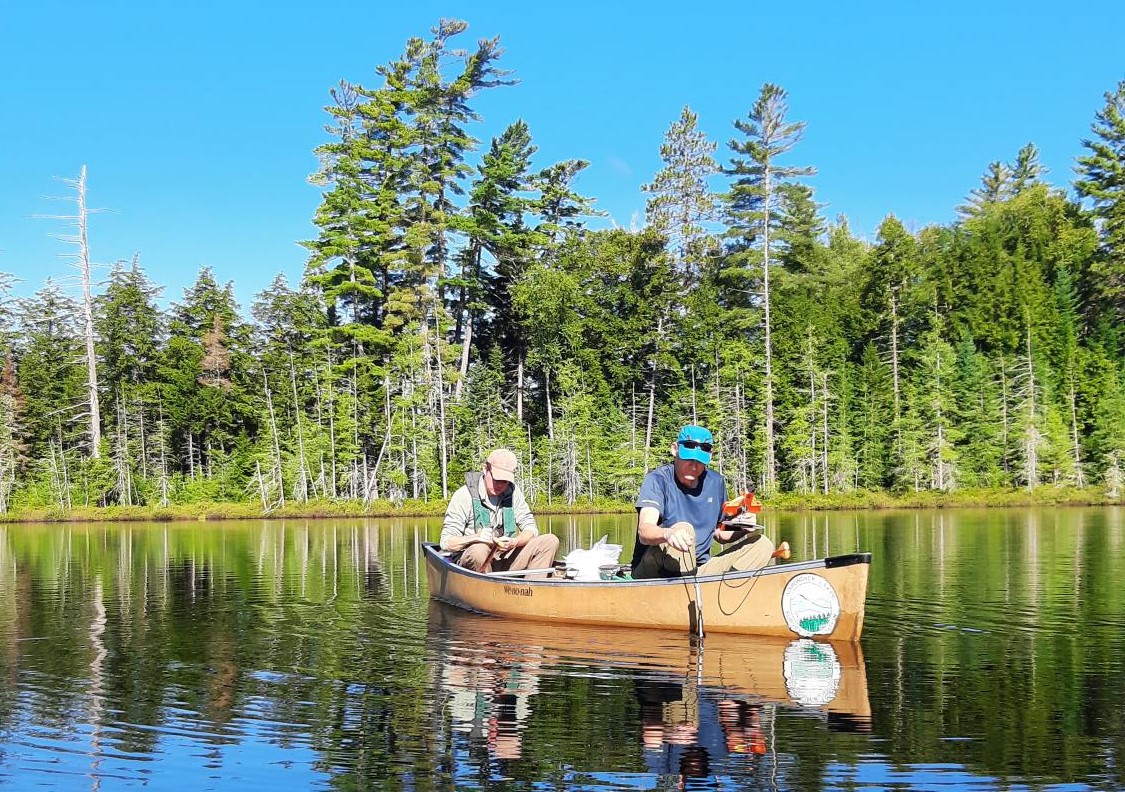 scientists collect water samples