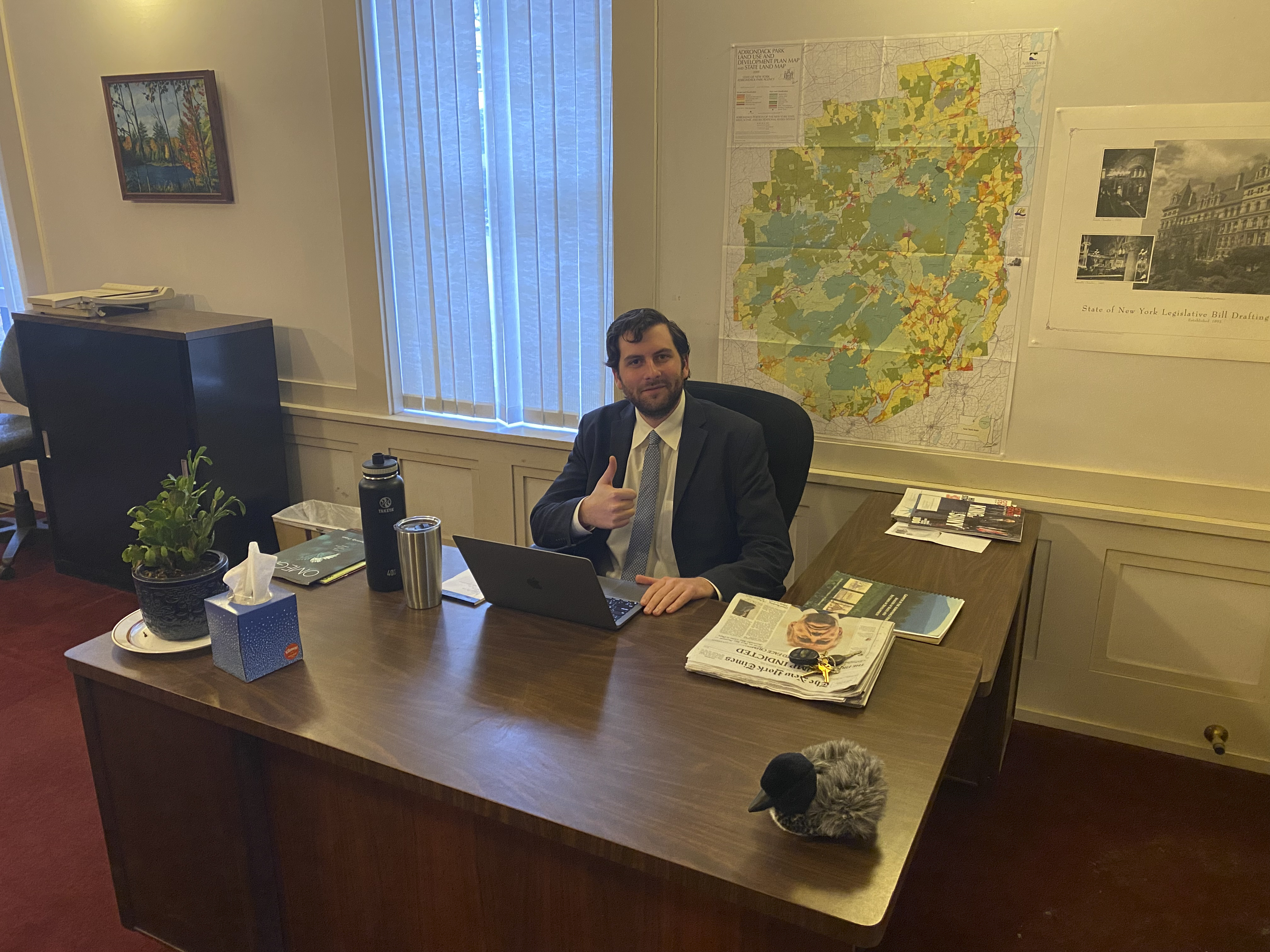 James Emmenegger at his desk in Albany
