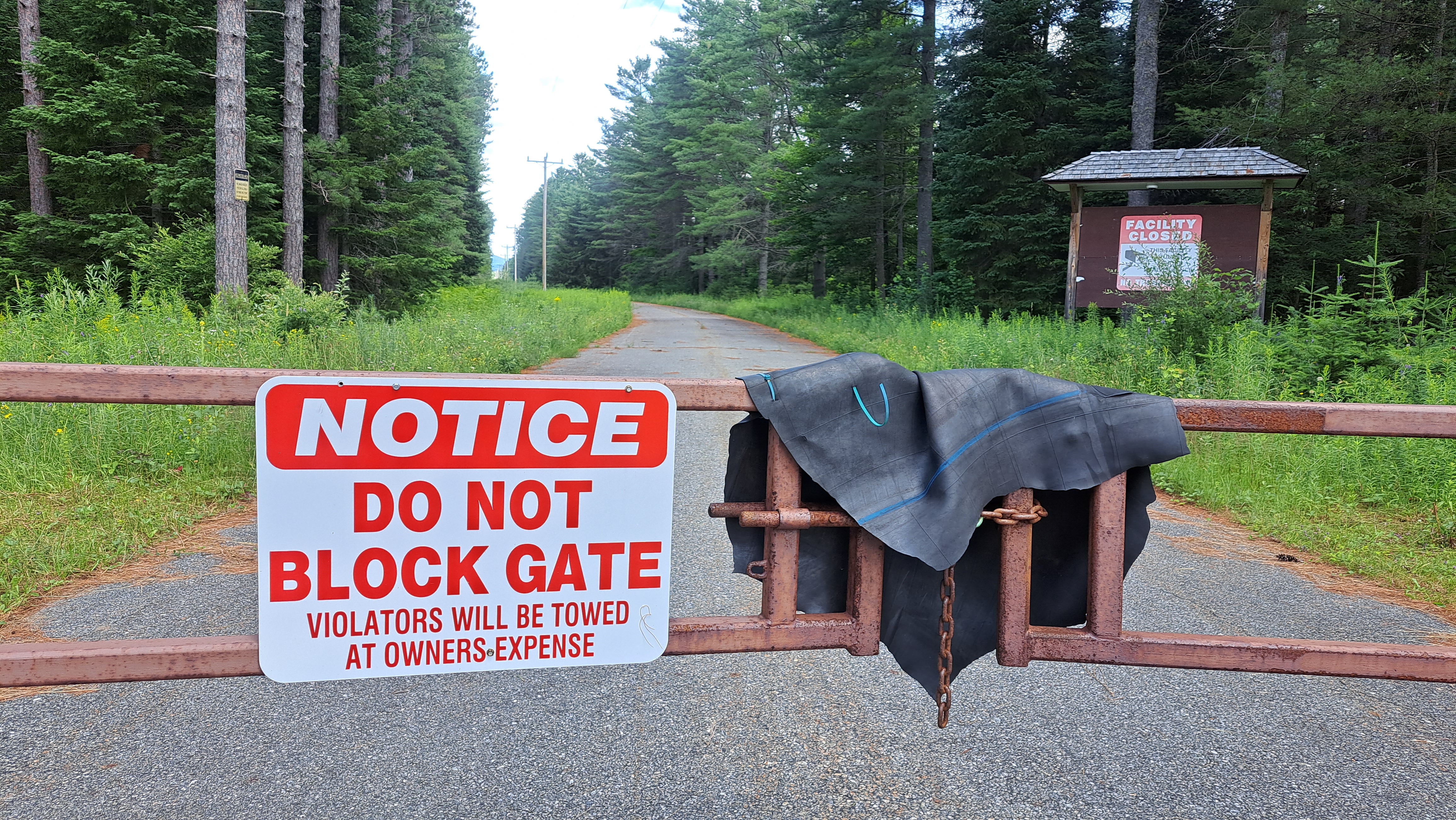 Locked gate at entrance of former Camp Gabriel's