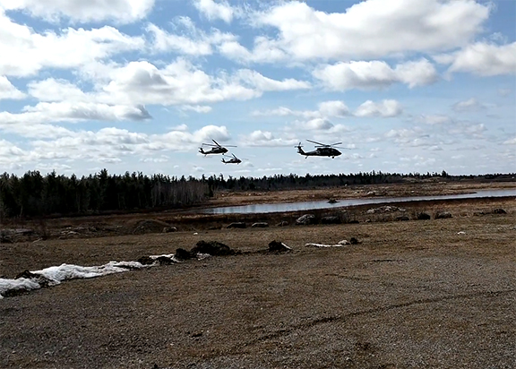 Uploaded Image: /vs-uploads/images/Helicopters_Taking_off.jpg