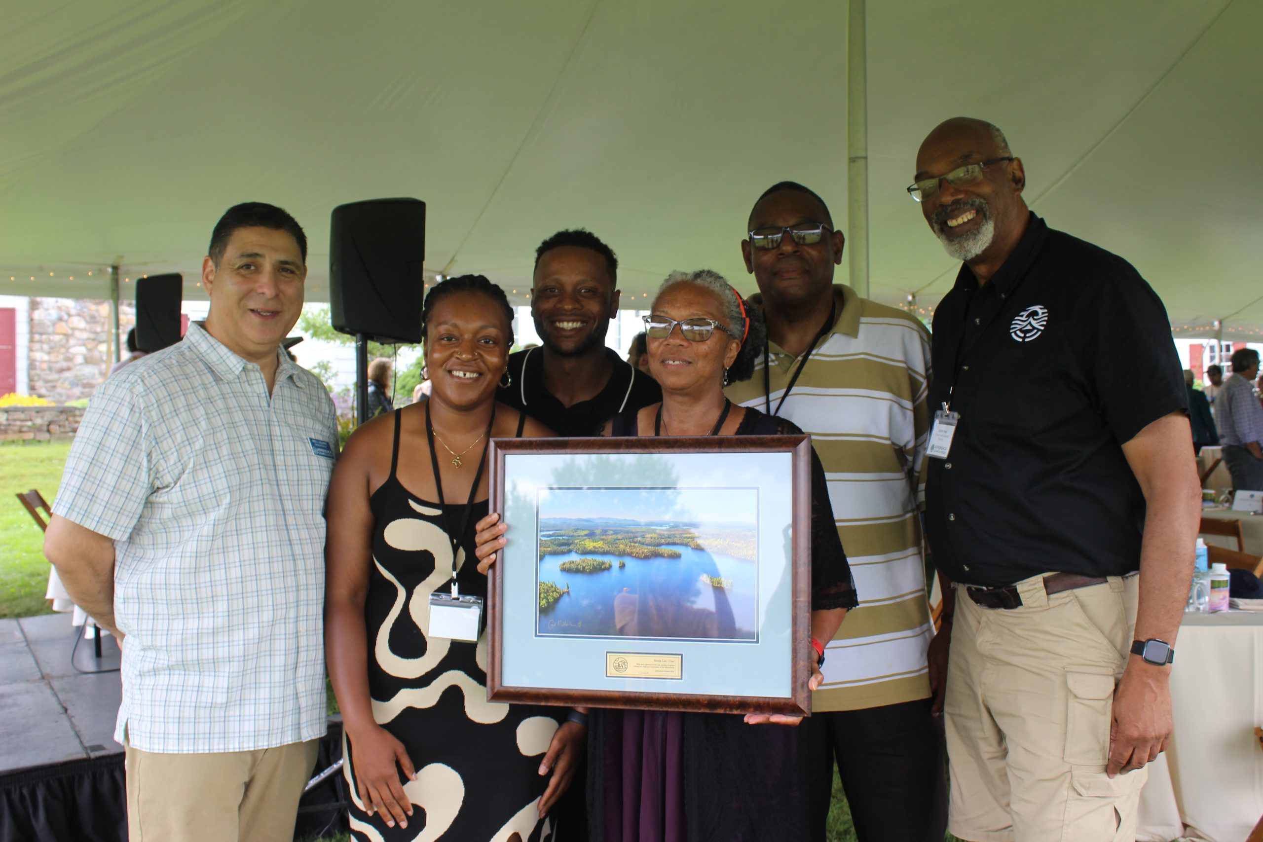 Benita Law-Diao with her Special Recognition Award, plus friends and family