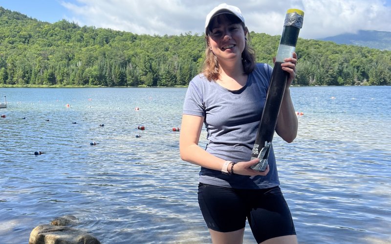 Scientist Hooler with a core sample of an Adirondack lake
